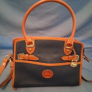 Dooney & Bourke Black and Tan Satchel with Structured Design